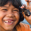 Young Child With Beetle