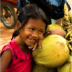 Young Girl With Coconuts