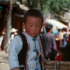 Chinese boy in a basket