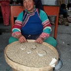 Lady Selling Seeds In The Market of Dali