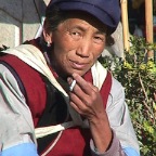 Old Naxi Woman Having a Smoke