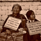 Woman & Child With Protest Signs