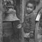 Young Boy Ringing The Bell