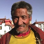 Old Tibetan Man In Front Of Jokhang Temple